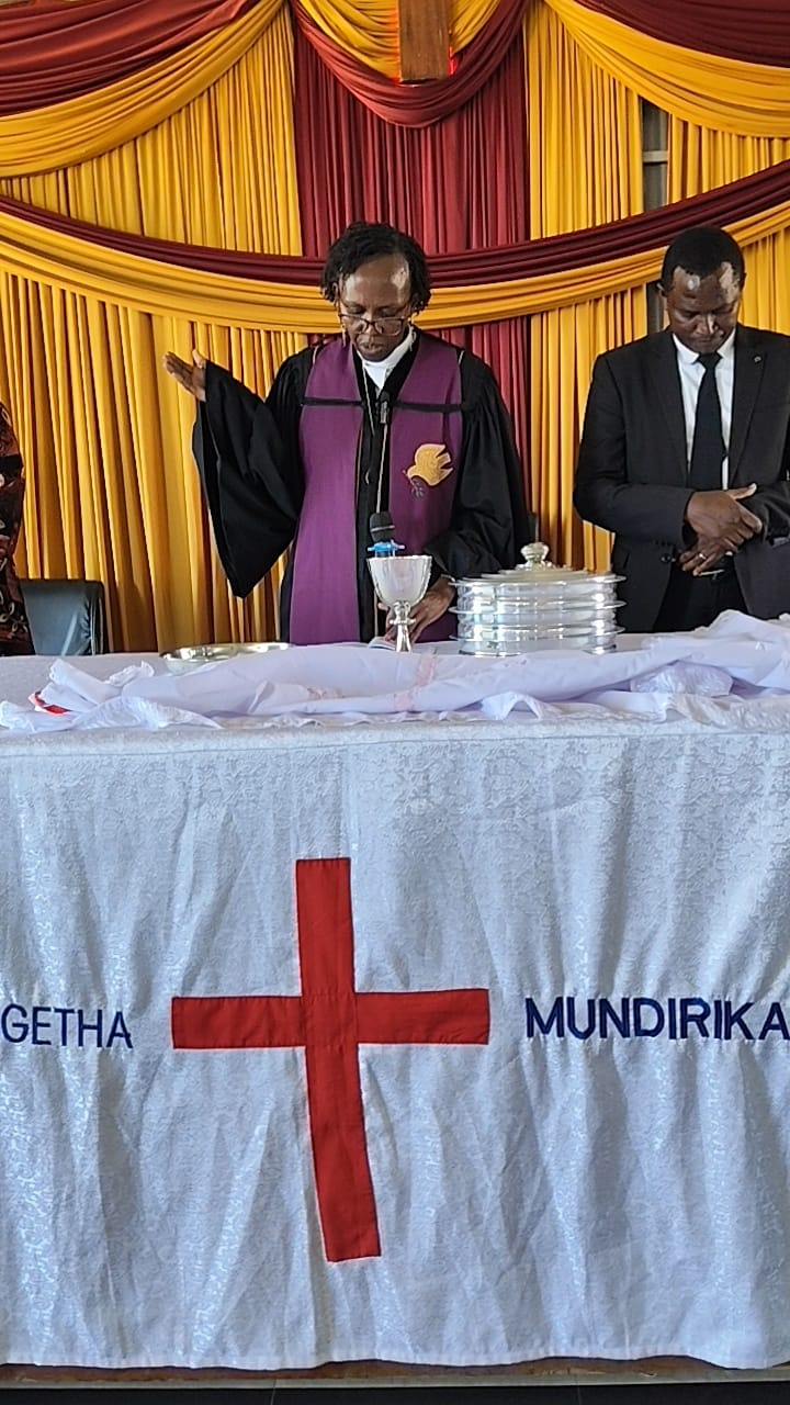 Rev. Irene leading a communion service